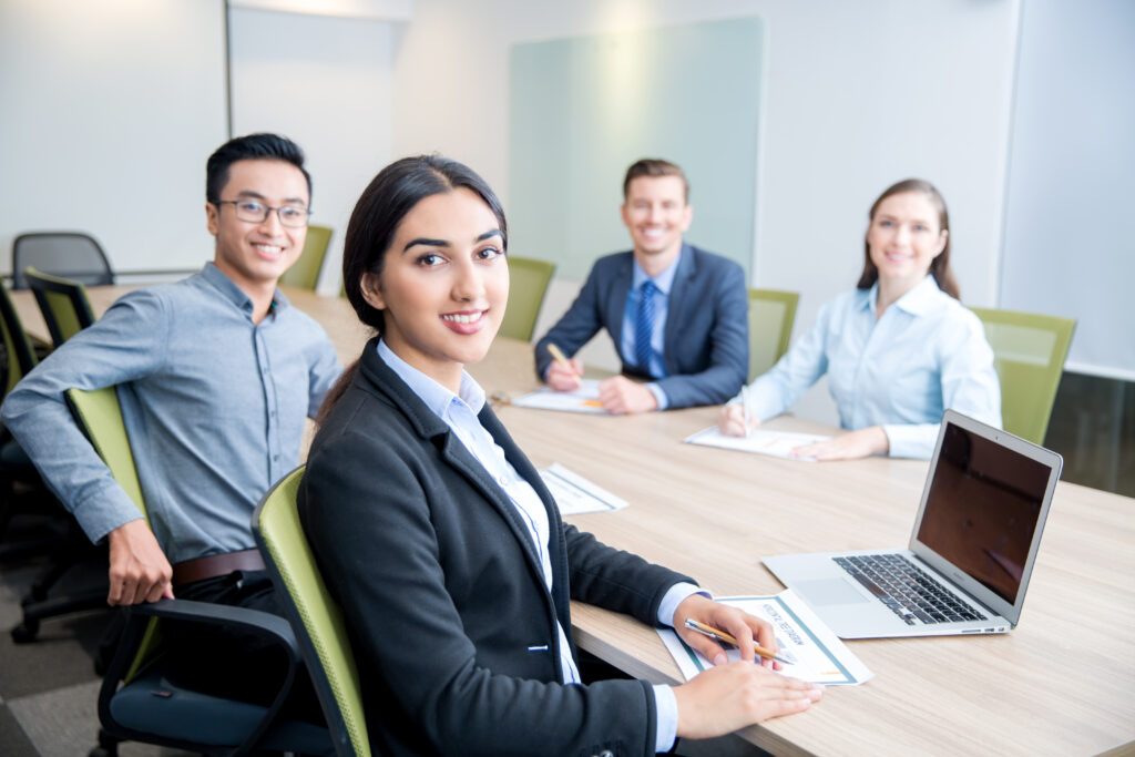 smiling business lady working with colleagues